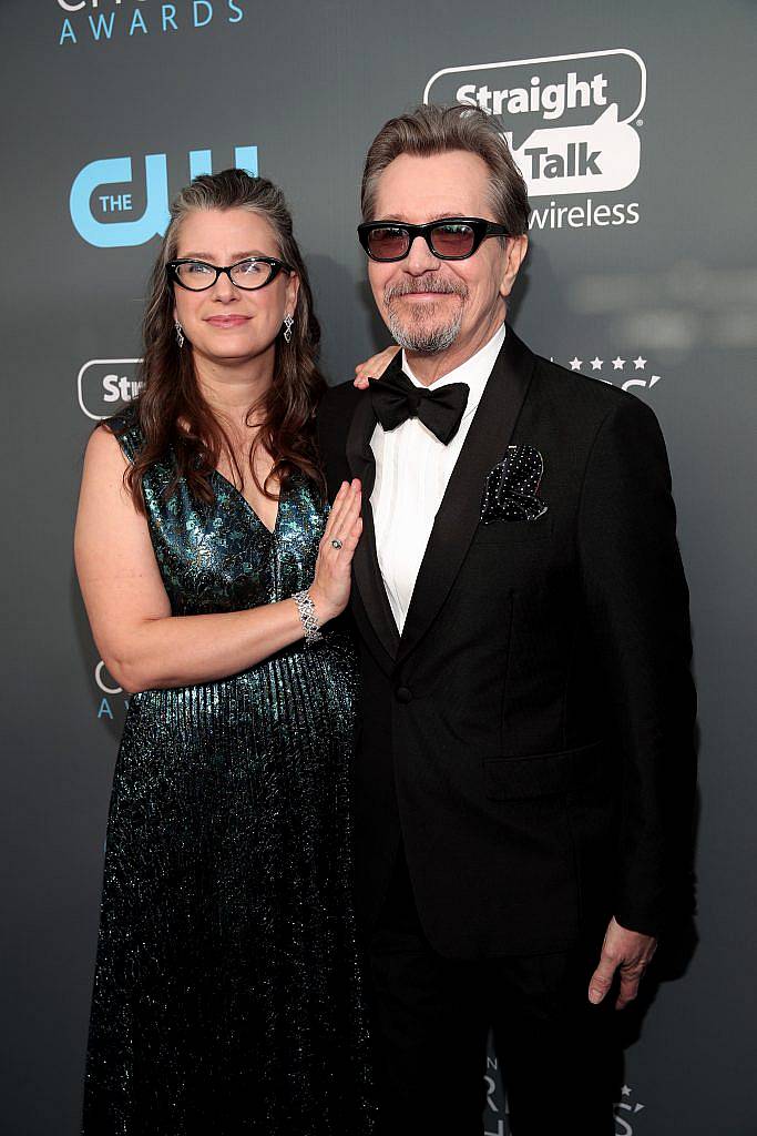 SANTA MONICA, CA - JANUARY 11:  Gisele Schmidt (L) and actor Gary Oldman attend The 23rd Annual Critics' Choice Awards at Barker Hangar on January 11, 2018 in Santa Monica, California.  (Photo by Christopher Polk/Getty Images for The Critics' Choice Awards  )