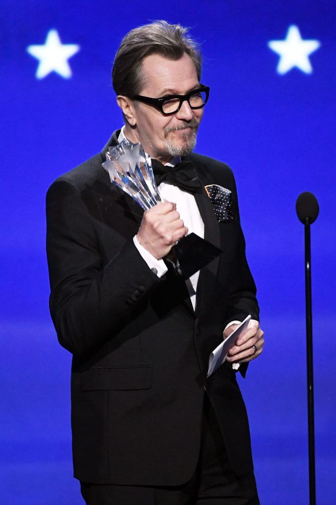 Actor Gary Oldman accepts Best Actor for 'Darkest Hour' onstage during The 23rd Annual Critics' Choice Awards at Barker Hangar on January 11, 2018 in Santa Monica, California.  (Photo by Kevin Winter/Getty Images)