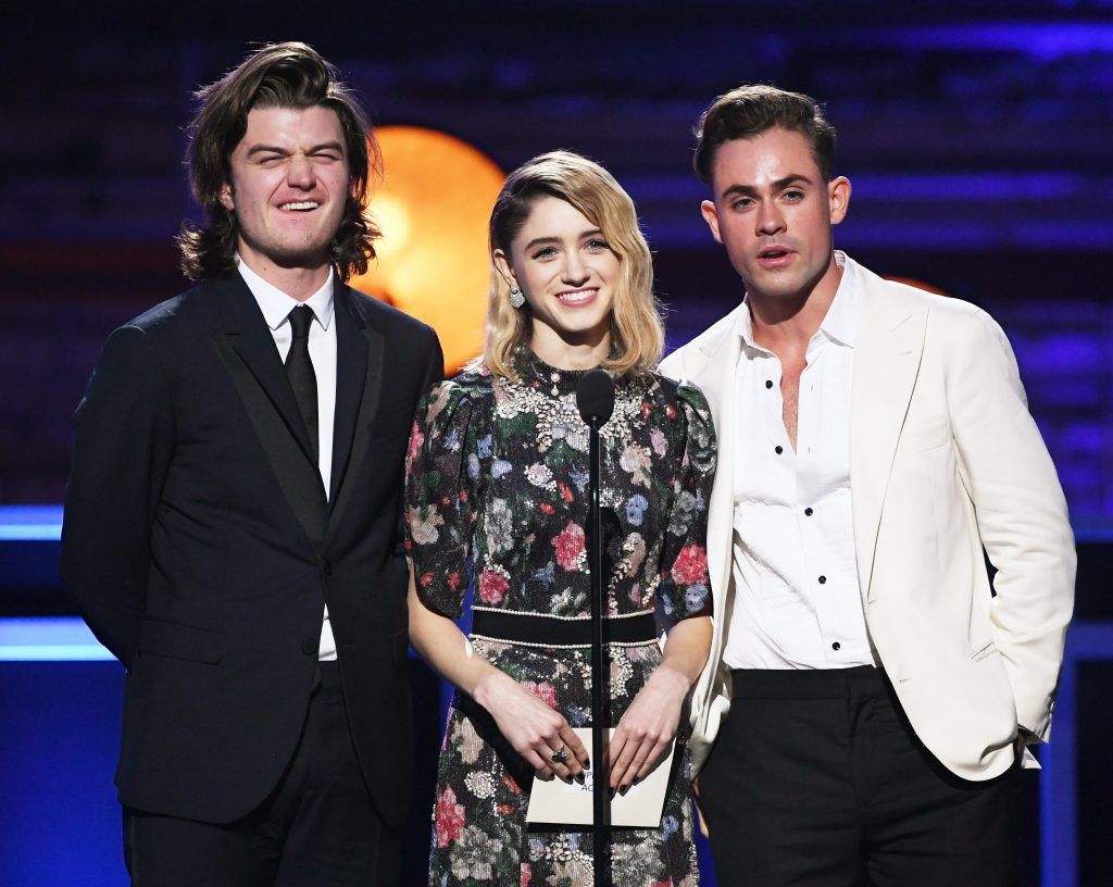 Actors Joe Keery, Natalia Dyer and Dacre Montgomery speak onstage during The 23rd Annual Critics' Choice Awards at Barker Hangar on January 11, 2018 in Santa Monica, California.  (Photo by Kevin Winter/Getty Images)