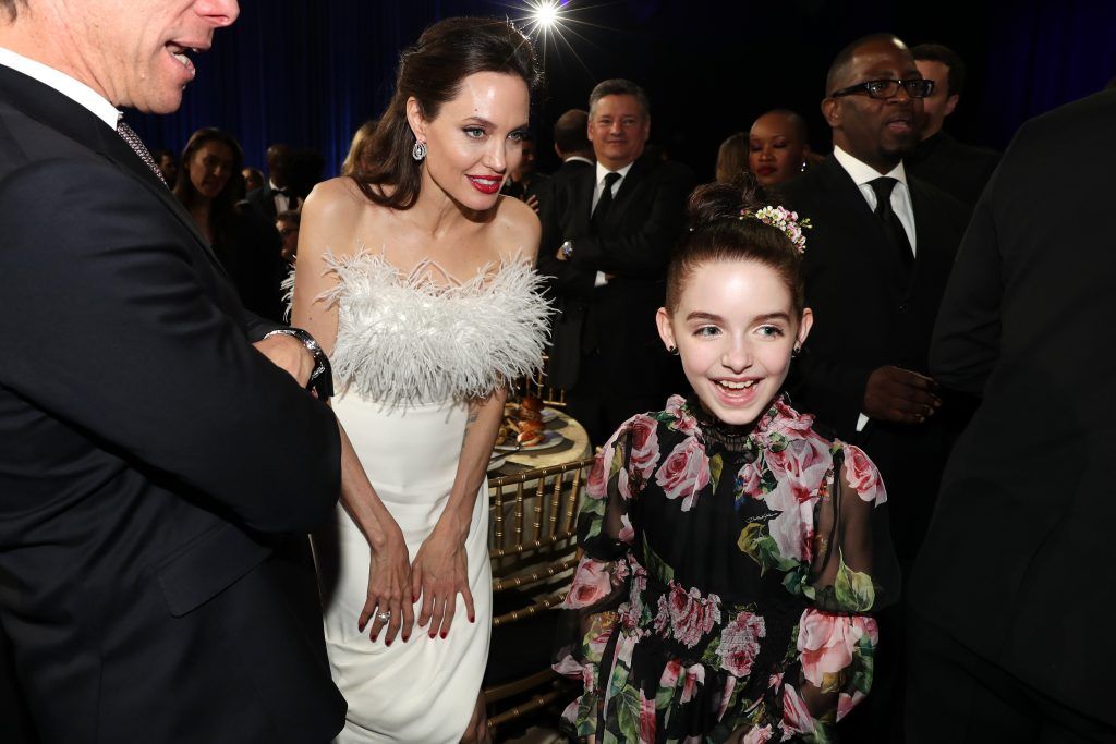 Actor Angleina Jolie (L) and Mckenna Grace attend The 23rd Annual Critics' Choice Awards at Barker Hangar on January 11, 2018 in Santa Monica, California.  (Photo by Christopher Polk/Getty Images for The Critics' Choice Awards  )