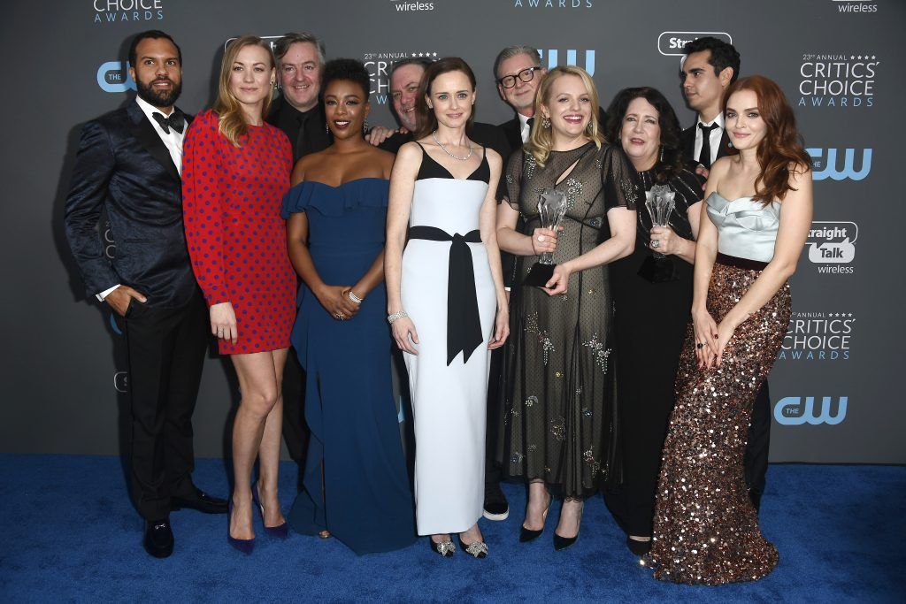 The Cast and Crew of 'The Handmaid's Tale', recipients of the Best Drama Series award, pose in the press room (Photo by Frazer Harrison/Getty Images)