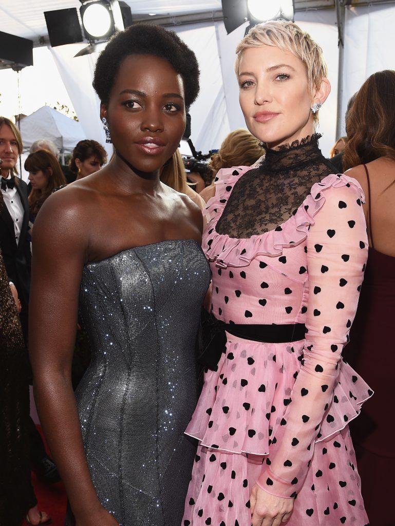 LOS ANGELES, CA - JANUARY 21:  Actors Lupita Nyong'o (L) and Kate Hudson attend the 24th Annual Screen Actors Guild Awards at The Shrine Auditorium on January 21, 2018 in Los Angeles, California.  (Photo by Kevork Djansezian/Getty Images)