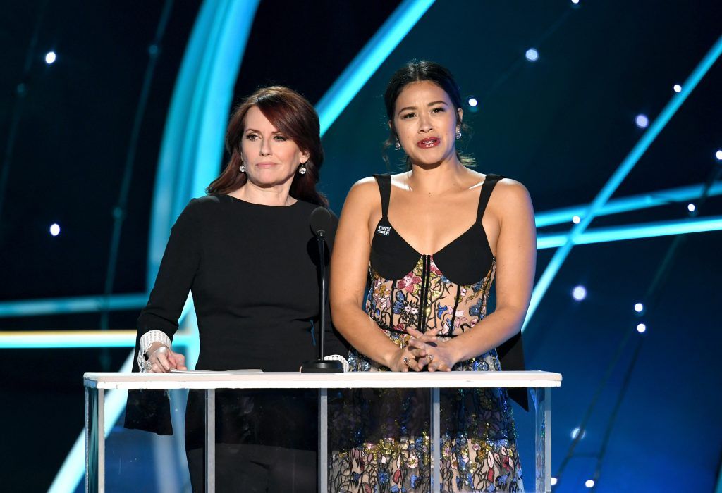 Actors Megan Mullally (L) and Gina Rodriguez speak onstage during the 24th Annual Screen Actors Guild Awards at The Shrine Auditorium on January 21, 2018 in Los Angeles, California. (Photo by Kevin Winter/Getty Images)