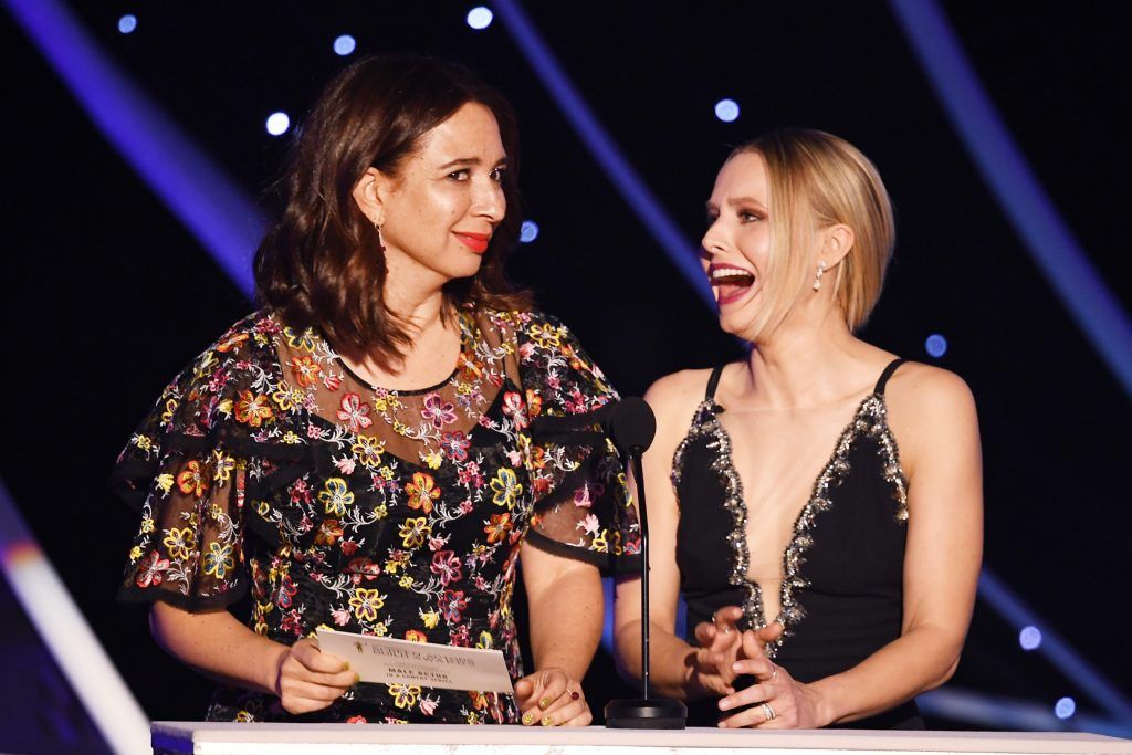 Actor Maya Rudolph (L) and host Kristen Bell speak onstage during the 24th Annual Screen Actors Guild Awards at The Shrine Auditorium on January 21, 2018 in Los Angeles, California. (Photo by Kevin Winter/Getty Images)