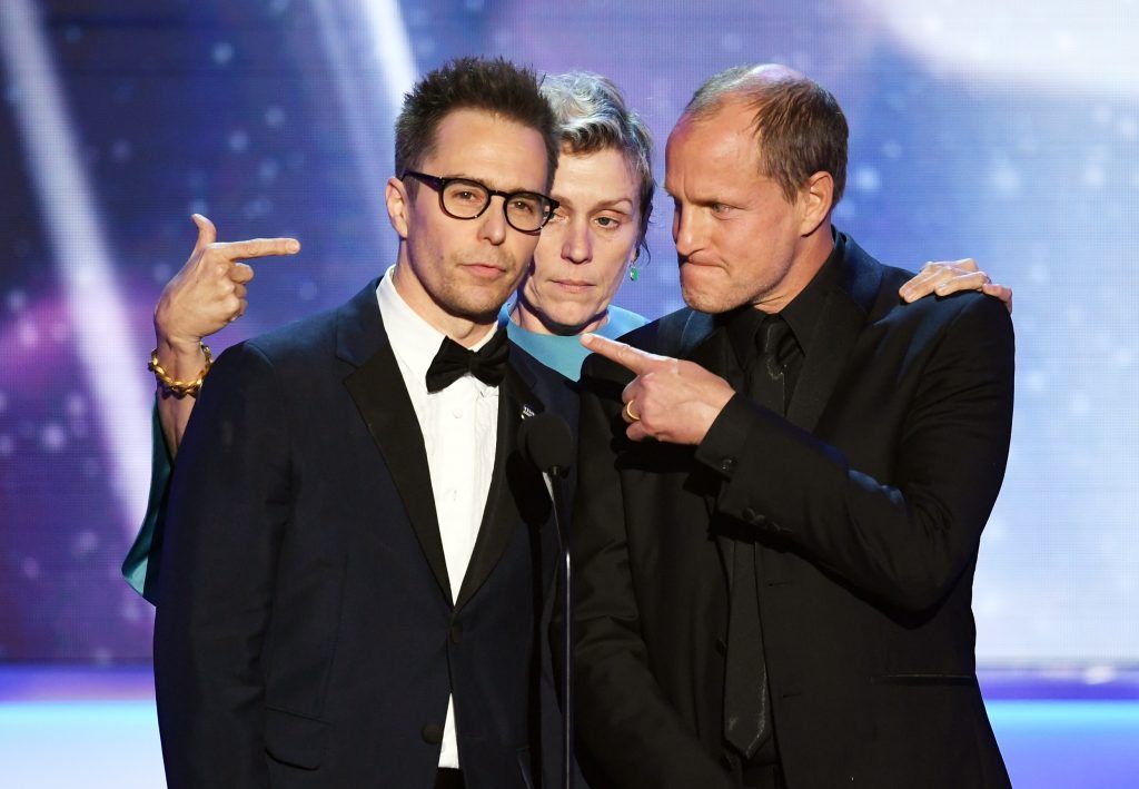 Actors Sam Rockwell, Frances McDormand, and Woody Harrelson speak onstage during the 24th Annual Screen Actors Guild Awards at The Shrine Auditorium on January 21, 2018 in Los Angeles, California.  (Photo by Kevin Winter/Getty Images)
