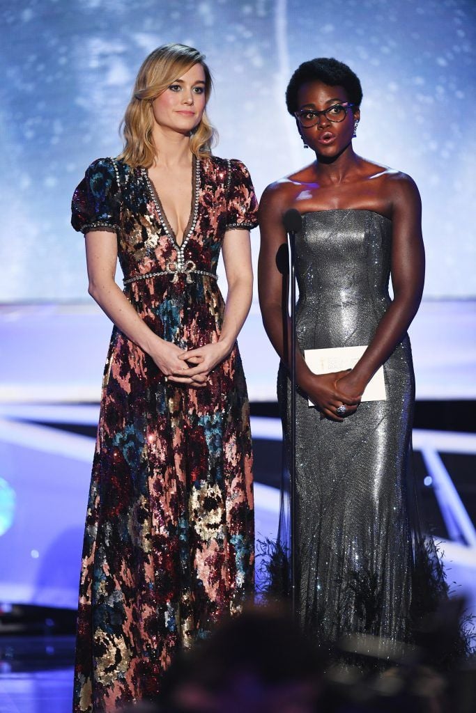 Actors Brie Larson (L) and Lupita Nyong'o speak onstage during the 24th Annual Screen Actors Guild Awards at The Shrine Auditorium on January 21, 2018 in Los Angeles, California. (Photo by Kevin Winter/Getty Images)