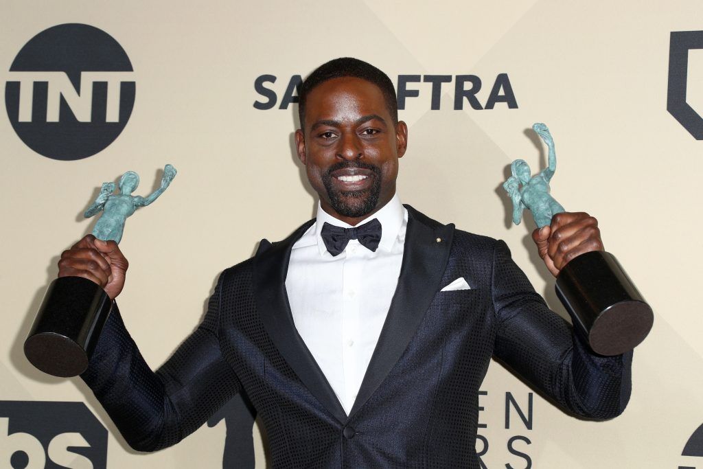 Actor Sterling K. Brown, winner of Outstanding Performance by a Male Actor in a Drama Series and Outstanding Performance by an Ensemble in a Drama Series for 'This Is Us', poses in the press room during the 24th Annual Screen Actors Guild Awards at The Shrine Auditorium on January 21, 2018 in Los Angeles, California.  (Photo by Frederick M. Brown/Getty Images)