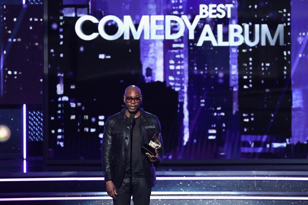 Comedian Dave Chappelle accepts Best Comedy Album for 'The Age of Spin'/'Deep in the Heart of Texas' onstage during the 60th Annual GRAMMY Awards at Madison Square Garden on January 28, 2018 in New York City.  (Photo by Kevin Winter/Getty Images for NARAS)