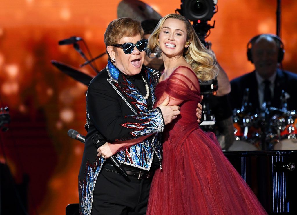 Recording artists Sir Elton John (L) and Miley Cyrus perform onstage during the 60th Annual GRAMMY Awards at Madison Square Garden on January 28, 2018 in New York City.  (Photo by Kevin Winter/Getty Images for NARAS)