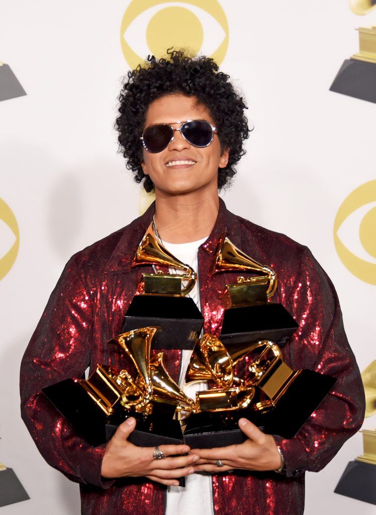 Recording artist Bruno Mars poses in the press room during the 60th Annual GRAMMY Awards at Madison Square Garden on January 28, 2018 in New York City.  (Photo by Michael Loccisano/Getty Images for NARAS)