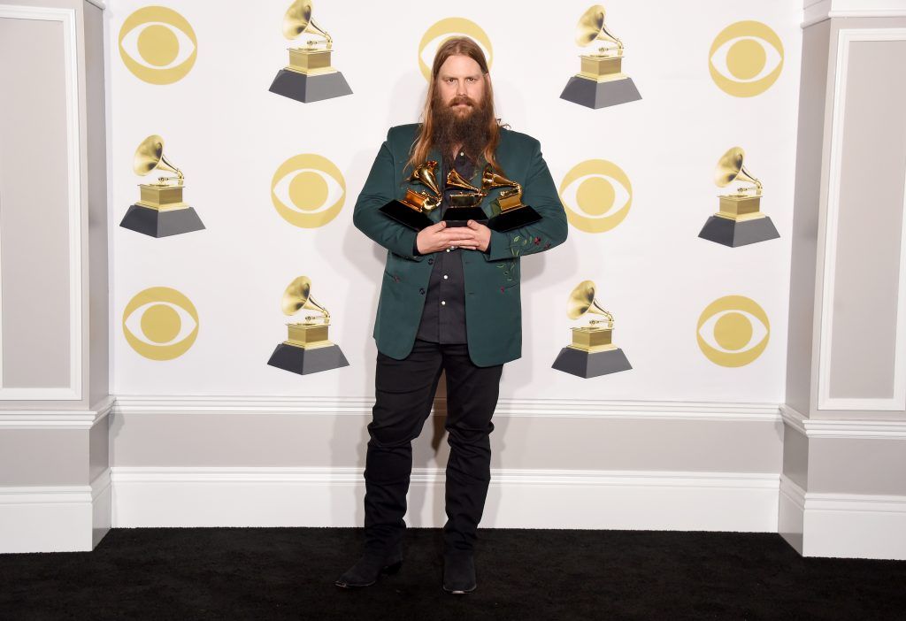 Recording artist Chris Stapleton, winner of the Best Country Album award for 'From A Room: Volume 1,' Best Country Solo Performance award for 'Either Way,' and Best Country Song for 'Broken Halos,' poses in the press room during the 60th Annual GRAMMY Awards at Madison Square Garden on January 28, 2018 in New York City.  (Photo by Michael Loccisano/Getty Images for NARAS)