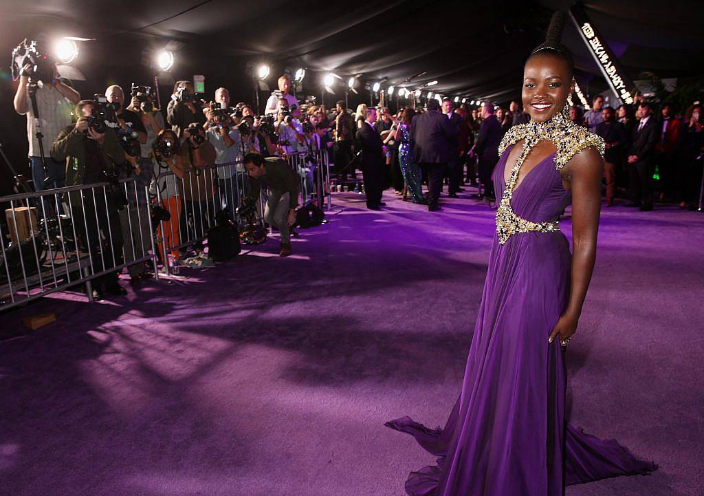 Actor Lupita Nyong'o at the Los Angeles World Premiere of Marvel Studios' BLACK PANTHER at Dolby Theatre on January 29, 2018 in Hollywood, California.  (Photo by Jesse Grant/Getty Images for Disney)