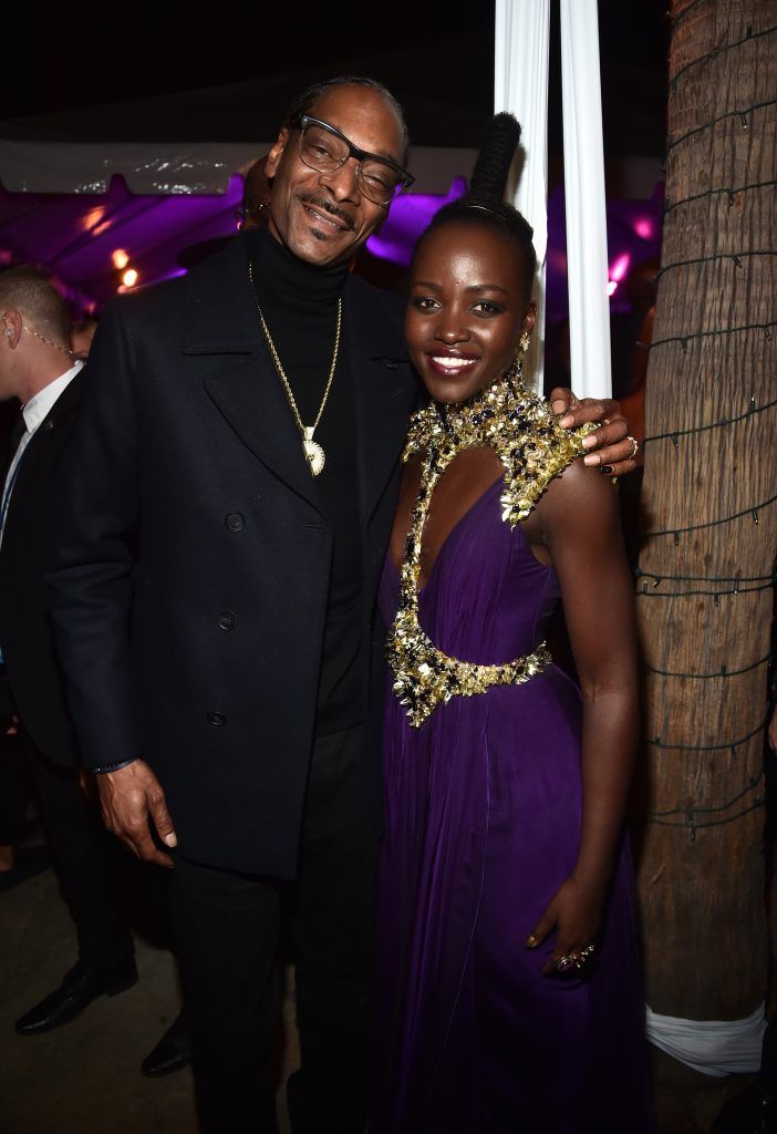 Rapper Snoop Dogg (L) and actor Lupita Nyong'o at the Los Angeles World Premiere of Marvel Studios' BLACK PANTHER at Dolby Theatre on January 29, 2018 in Hollywood, California.  (Photo by Alberto E. Rodriguez/Getty Images for Disney)