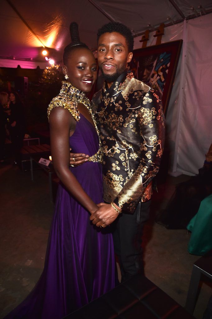 Actors Lupita Nyong'o (L) and Chadwick Boseman at the Los Angeles World Premiere of Marvel Studios' BLACK PANTHER at Dolby Theatre on January 29, 2018 in Hollywood, California.  (Photo by Alberto E. Rodriguez/Getty Images for Disney)