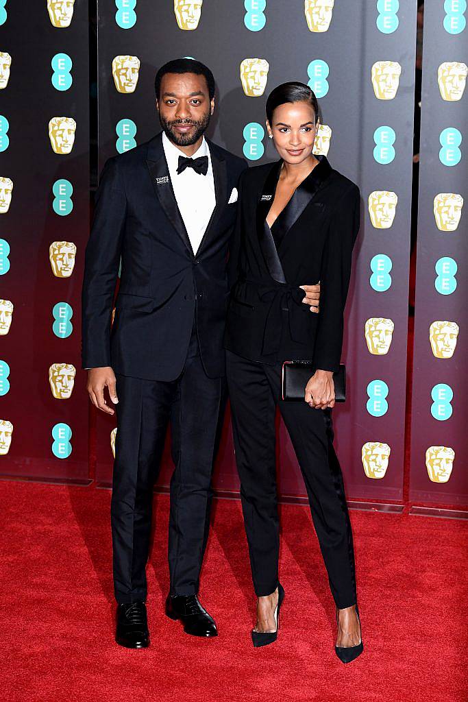 LONDON, ENGLAND - FEBRUARY 18: Chiwetel Ejiofor and Frances Aaternir attend the EE British Academy Film Awards (BAFTA) held at Royal Albert Hall on February 18, 2018 in London, England.  (Photo by Jeff Spicer/Jeff Spicer/Getty Images)