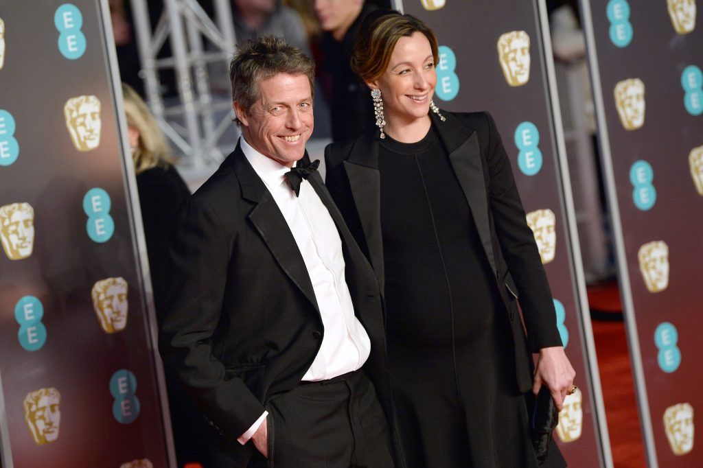 LONDON, ENGLAND - FEBRUARY 18:  Hugh Grant and Anna Eberstein attend the EE British Academy Film Awards (BAFTA) held at Royal Albert Hall on February 18, 2018 in London, England.  (Photo by Jeff Spicer/Jeff Spicer/Getty Images)