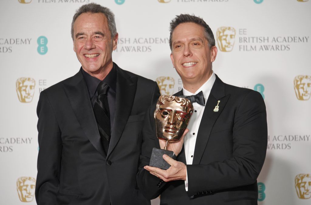 Jim Morris (L) and Lee Unkrich, winners of the Best Animated Film award for "Coco", pose in the press room during the EE British Academy Film Awards (BAFTA) held at Royal Albert Hall on February 18, 2018 in London, England.  (Photo by David M. Benett/Dave Benett/Getty Images)
