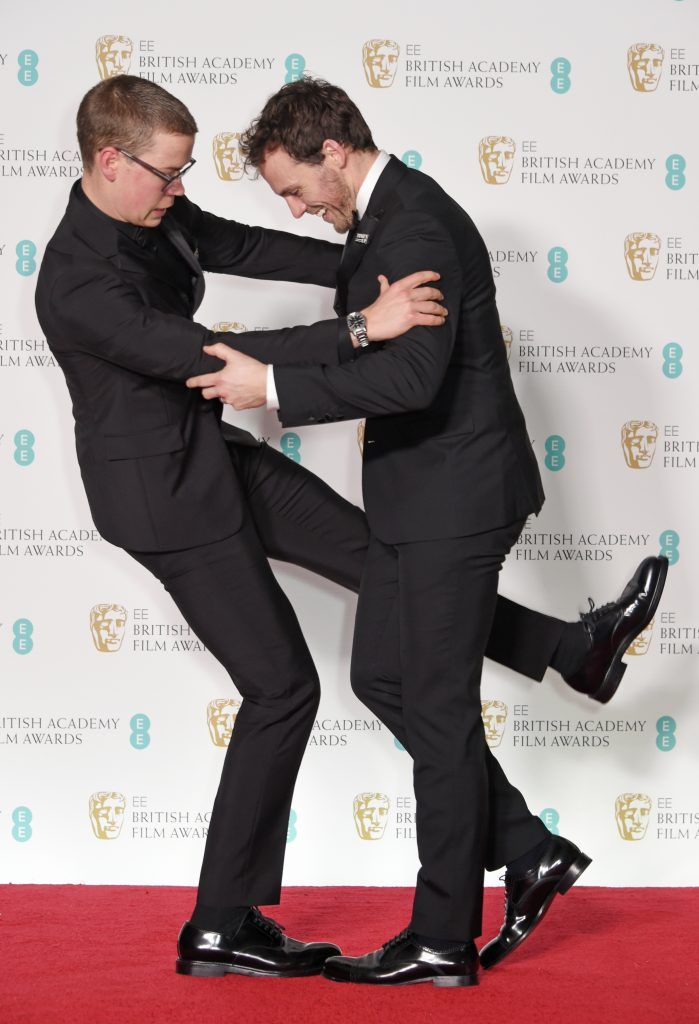 Will Poulter (L) and Sam Claflin pose in the press room during the EE British Academy Film Awards (BAFTA) held at Royal Albert Hall on February 18, 2018 in London, England.  (Photo by David M. Benett/Dave Benett/Getty Images)