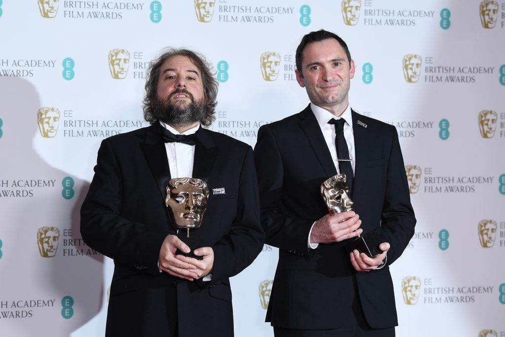 Paul Machliss and Jonathan Amos, winners of the Best Editing award for the movie 'Baby Driver' pose in the press room during the EE British Academy Film Awards (BAFTA) held at Royal Albert Hall on February 18, 2018 in London, England.  (Photo by Jeff Spicer/Jeff Spicer/Getty Images)