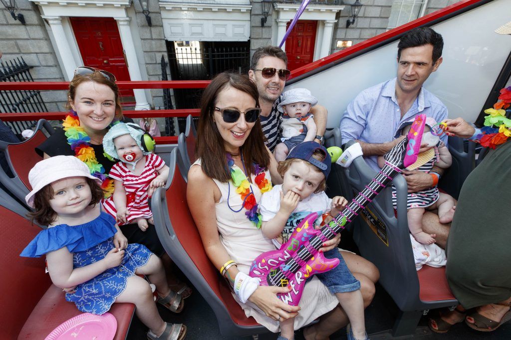 Niamh Fitzpatrick with kids Sophie and Cara, Aoifa and Kevin Crowley and their Kids Tom and Dan and Fergus McCormack with his daughter Vivienne pictured on the Mamma Mia! Here We Go Again float at this year's Dublin Pride Parade, Saturday June 30th. Picture Andres Poveda