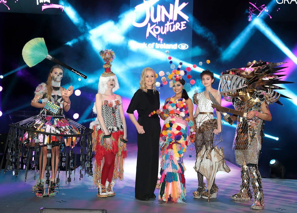 Laura Lynch -Head of Segments and Propositions at Bank of Ireland with  students pictured wearing  some of the fabulous creations fashioned from junk and recycled materials in rehearsals ahead of the  Grand Final of Bank of Ireland Junk Kouture 2018 at the 3 Arena Dublin.  86 hopeful students from all over Ireland are  gracing the catwalk in the 3Arena for  the eighth annual final.

Pic Brian McEvoy
No Repro fee
Pictured(  left to right)
Benita Wrochna -Ursuline Secondary School -Thurles
Tiegan Harris -Sancta Maria School -Westmeath
Tammy Wright -Scoil Chriost Ri, Portlaois
and Yannaah Somers-Malahide Community School