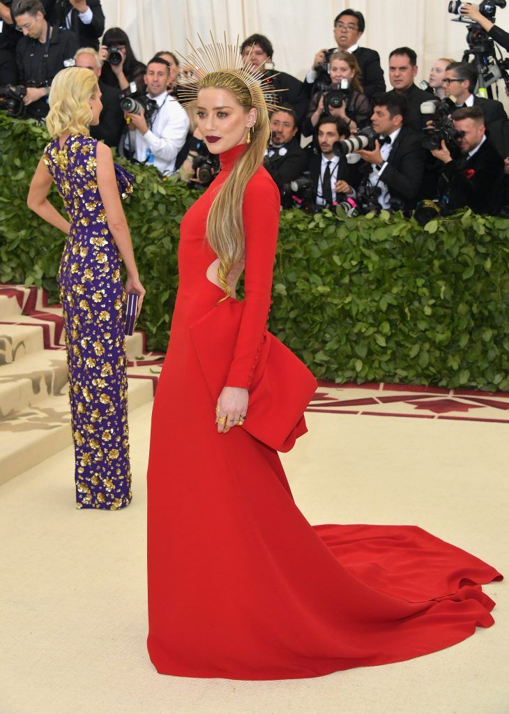 NEW YORK, NY - MAY 07:  Amber Heard attends the Heavenly Bodies: Fashion & The Catholic Imagination Costume Institute Gala at The Metropolitan Museum of Art on May 7, 2018 in New York City.  (Photo by Neilson Barnard/Getty Images)