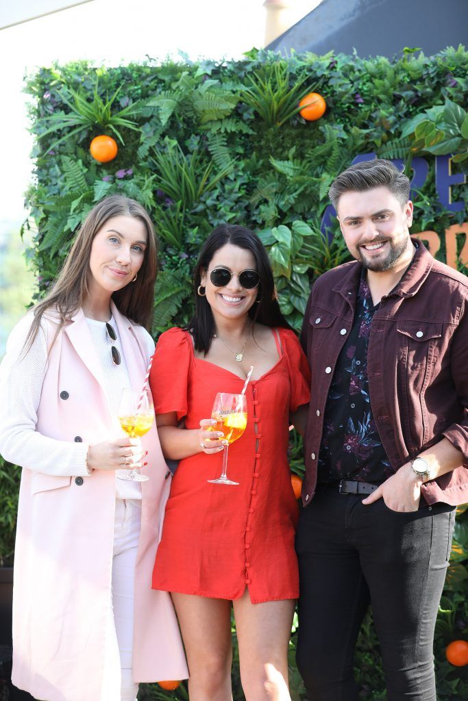 Clementine McNeice, Michelle Mc Grath and James Patrice pictured as Aperol Spritz, Italy's favourite aperitif, unveiled a new home in Dublin, Terrazza Aperol at Sophie's. Photo by Julien Behal