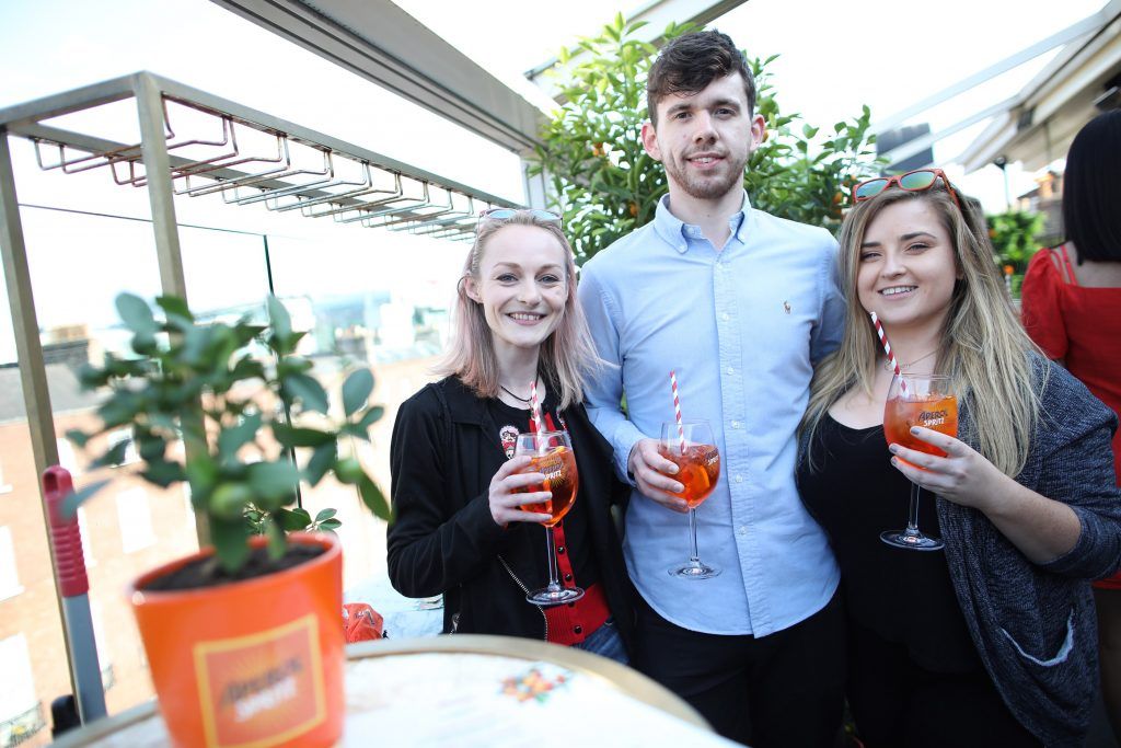 Catherine Royle, Joe McGoldrick and Emma Costello pictured as Aperol Spritz, Italy's favourite aperitif, unveiled a new home in Dublin, Terrazza Aperol at Sophie's. Photo by Julien Behal