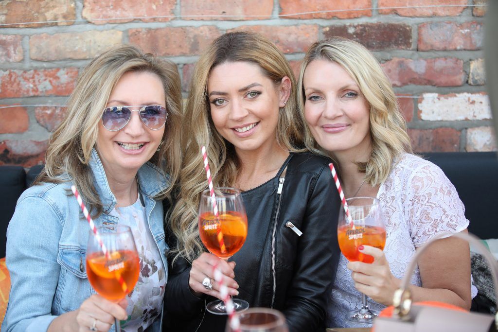Anne Downey, Sarah McGuinness and Simone Ceillier pictured as Aperol Spritz, Italy's favourite aperitif, unveiled a new home in Dublin, Terrazza Aperol at Sophie's. Photo by Julien Behal