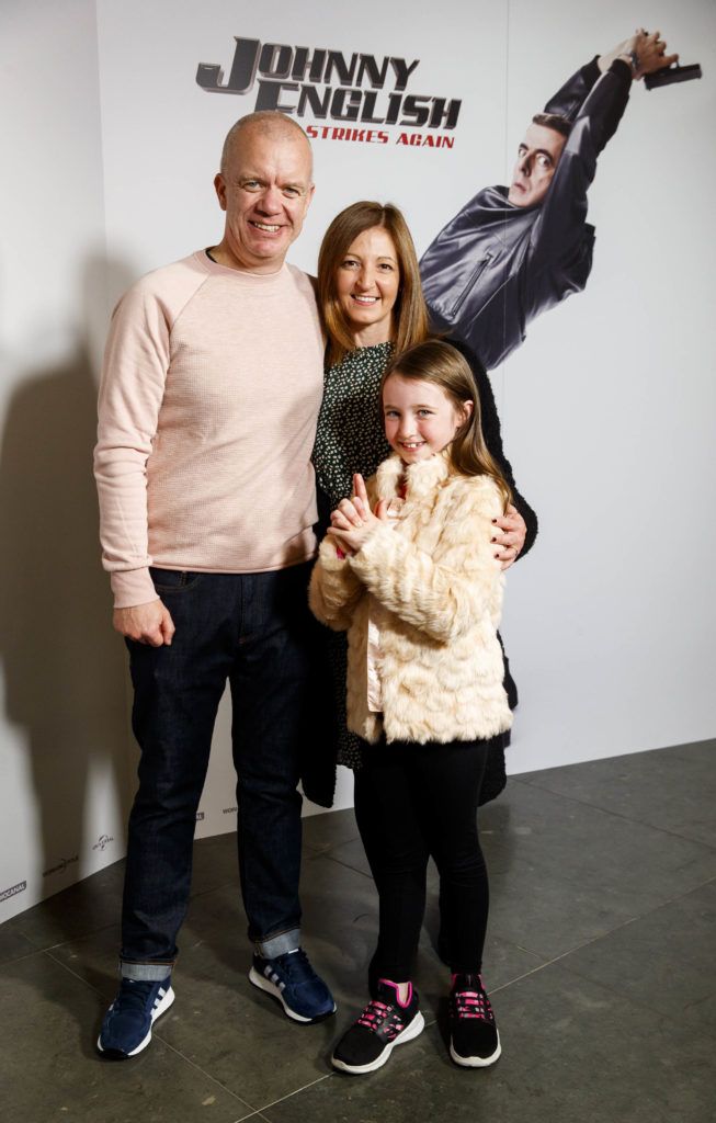 Gary, Karen and Emma Cosgrave (8) from Stillorgan pictured at a special preview screening of Johnny English Strikes Again at ODEON Point Village, Dublin. Picture Andres Poveda