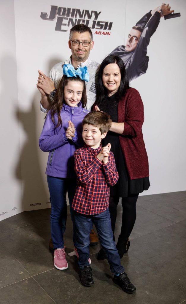 Niall, Nina and Sara (11) and Eoin Burke (6) pictured at a special preview screening of Johnny English Strikes Again at ODEON Point Village, Dublin. Picture Andres Poveda