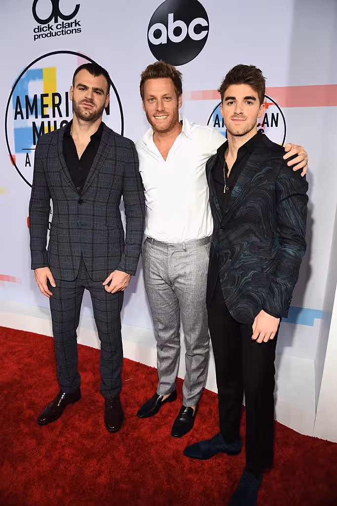 Alex Pall (L) and Andrew Taggart (R) of The Chainsmokers attend the 2018 American Music Awards at Microsoft Theater on October 9, 2018 in Los Angeles, California.  (Photo by Kevin Mazur/Getty Images For dcp)