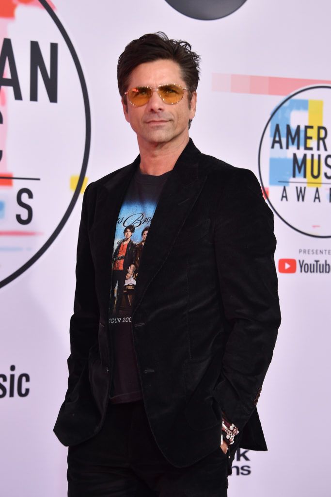 John Stamos attends the 2018 American Music Awards at Microsoft Theater on October 9, 2018 in Los Angeles, California.  (Photo by David Crotty/Patrick McMullan via Getty Images)