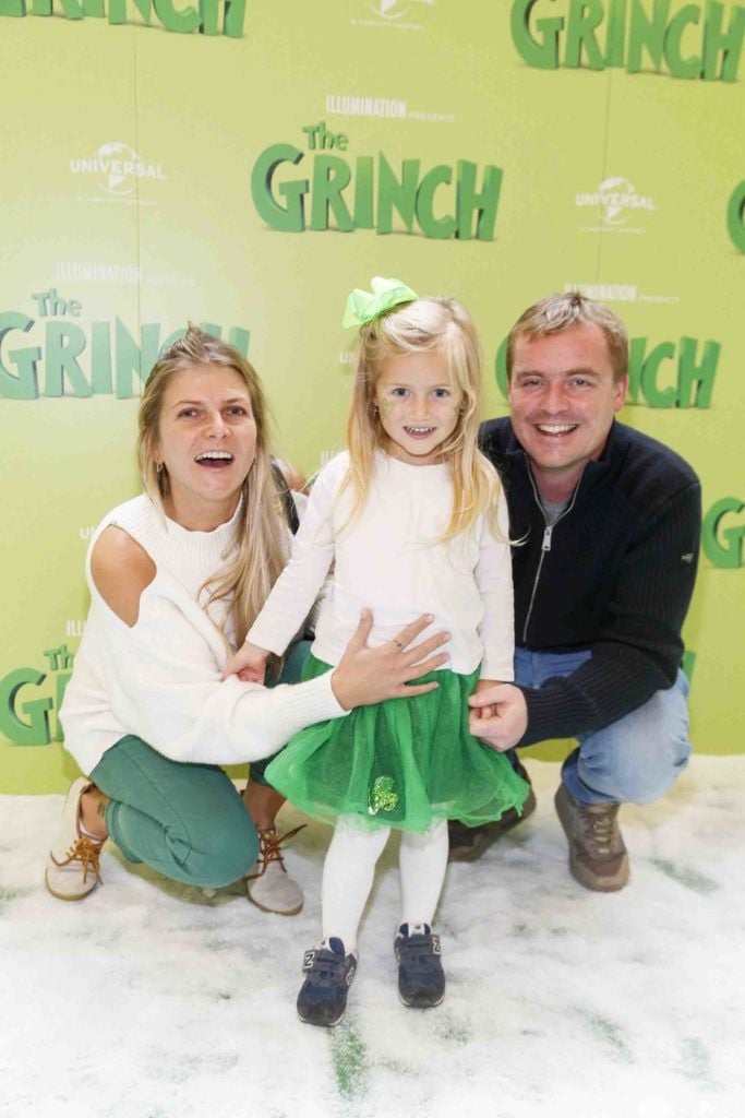 Inga, Maya (3) and Mark Murphy pictured at the Irish premiere screening of The Grinch at ODEON Point Village, Dublin. Picture Andres Poveda