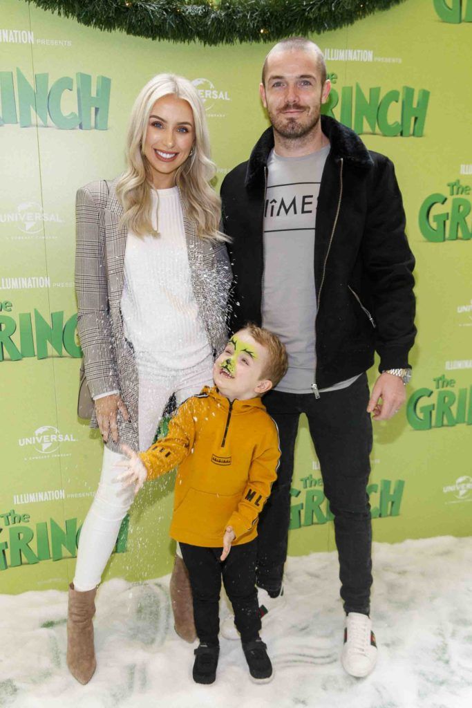 Rosie Connolly and Paul Quinn with Harry (3) pictured at the Irish premiere screening of The Grinch at ODEON Point Village, Dublin. Picture Andres Poveda