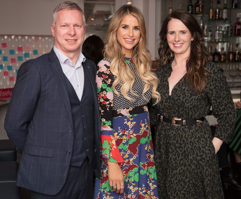 Eoin Donnelly , Vogue Williams & Hillary Hughes pictured at the launch of Lily O’Brien’s 'Share Wisely' bags. Photo: Anthony Woods