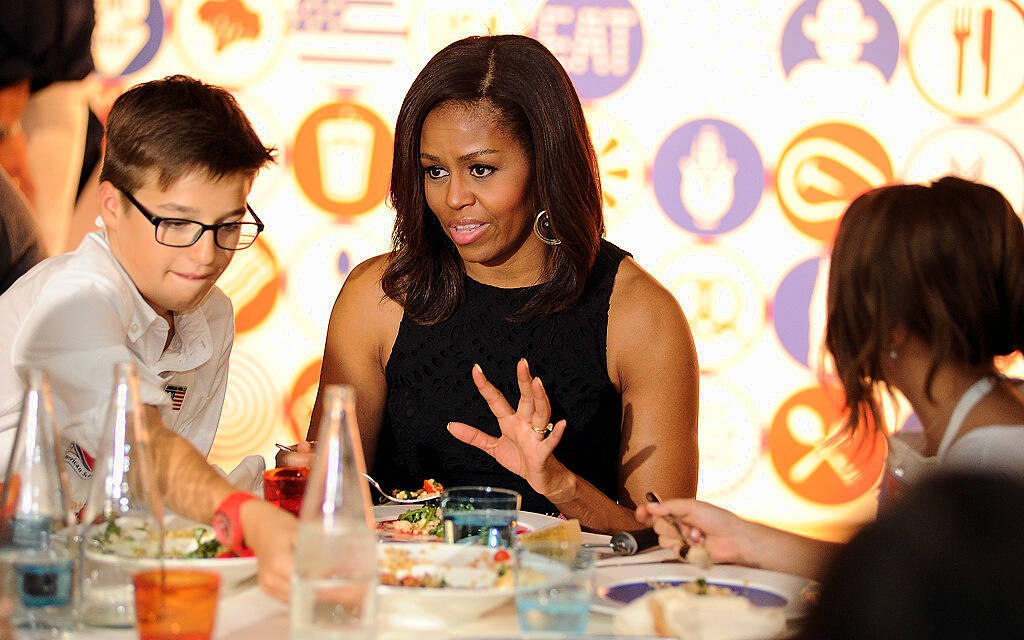 MILAN, ITALY - JUNE 17:  First Lady Michelle Obama hosts a cooking demonstration for local students at the James Beard American Restaurant on June 17, 2015 in Milan, Italy. (Photo by Pier Marco Tacca/Getty Images)