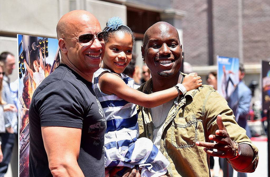 UNIVERSAL CITY, CA - JUNE 23:  Actors Vin Diesel, Tyrese Gibson and daughter Shayla Somer Gibson attend the premiere press event for the new Universal Studios Hollywood Ride "Fast & Furious-Supercharged" at Universal Studios Hollywood on June 23, 2015 in Universal City, California.  (Photo by Alberto E. Rodriguez/Getty Images)