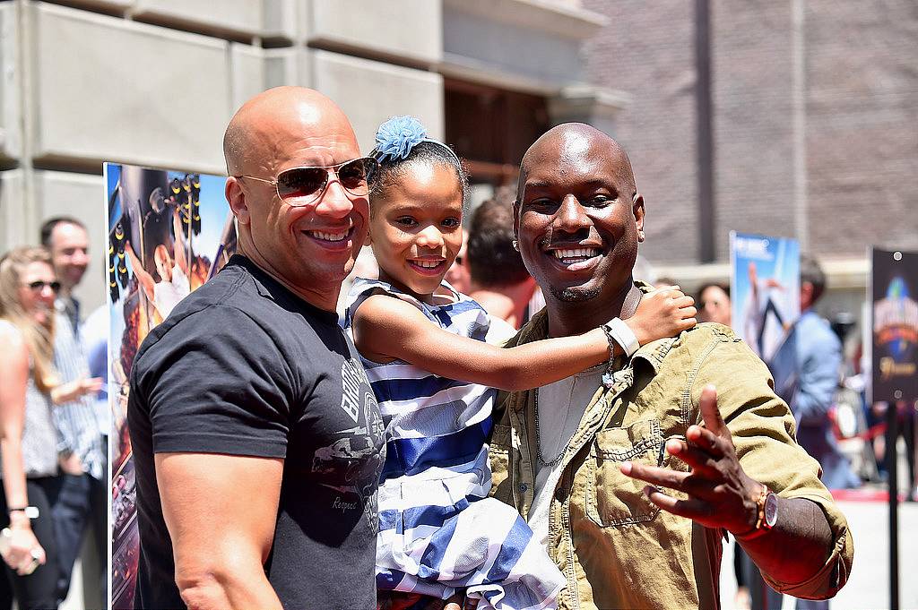 UNIVERSAL CITY, CA - JUNE 23:  Actors Vin Diesel, Tyrese Gibson and daughter Shayla Somer Gibson attend the premiere press event for the new Universal Studios Hollywood Ride "Fast & Furious-Supercharged" at Universal Studios Hollywood on June 23, 2015 in Universal City, California.  (Photo by Alberto E. Rodriguez/Getty Images)