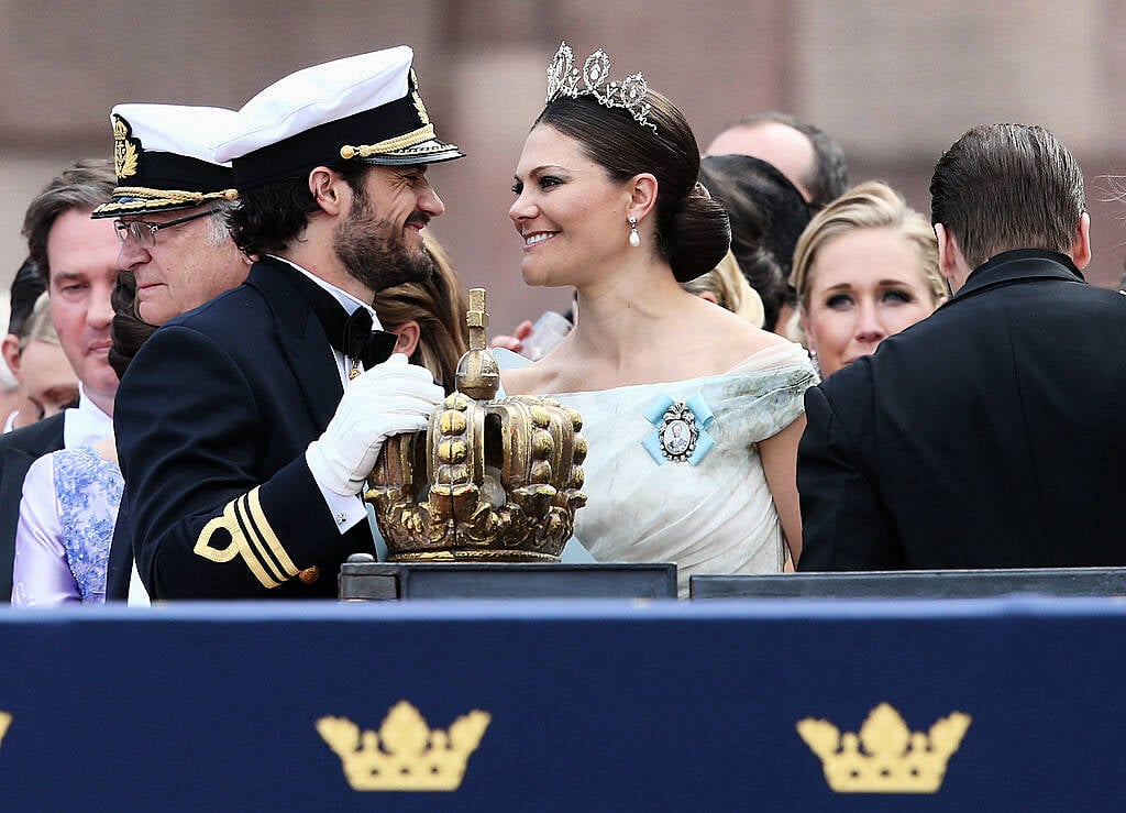 Prince Carl Philip of Sweden and HRH Princess Sofia, Duchess of Varmland ride in the wedding cortege after their marriage ceremony on June 13, 2015 in Stockholm, Sweden.