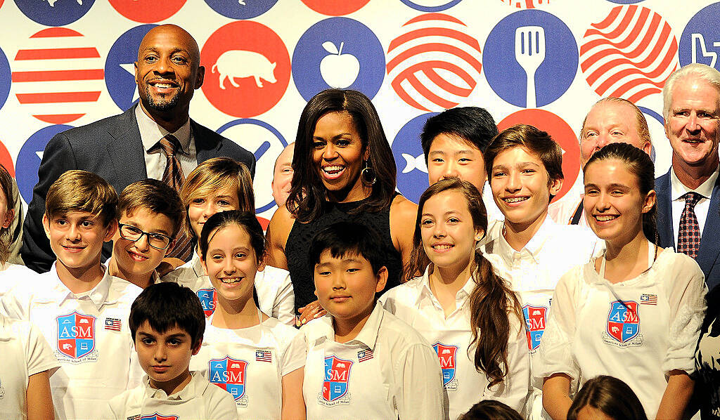 MILAN, ITALY - JUNE 17:  First Lady Michelle Obama hosts a cooking demonstration for local students at the James Beard American Restaurant on June 17, 2015 in Milan, Italy. After visiting London, Michelle Obama has travelled to Italy where she is expected to speak about her 'Let's Move' initiative to combat childhood obesity.  (Photo by Pier Marco Tacca/Getty Images)