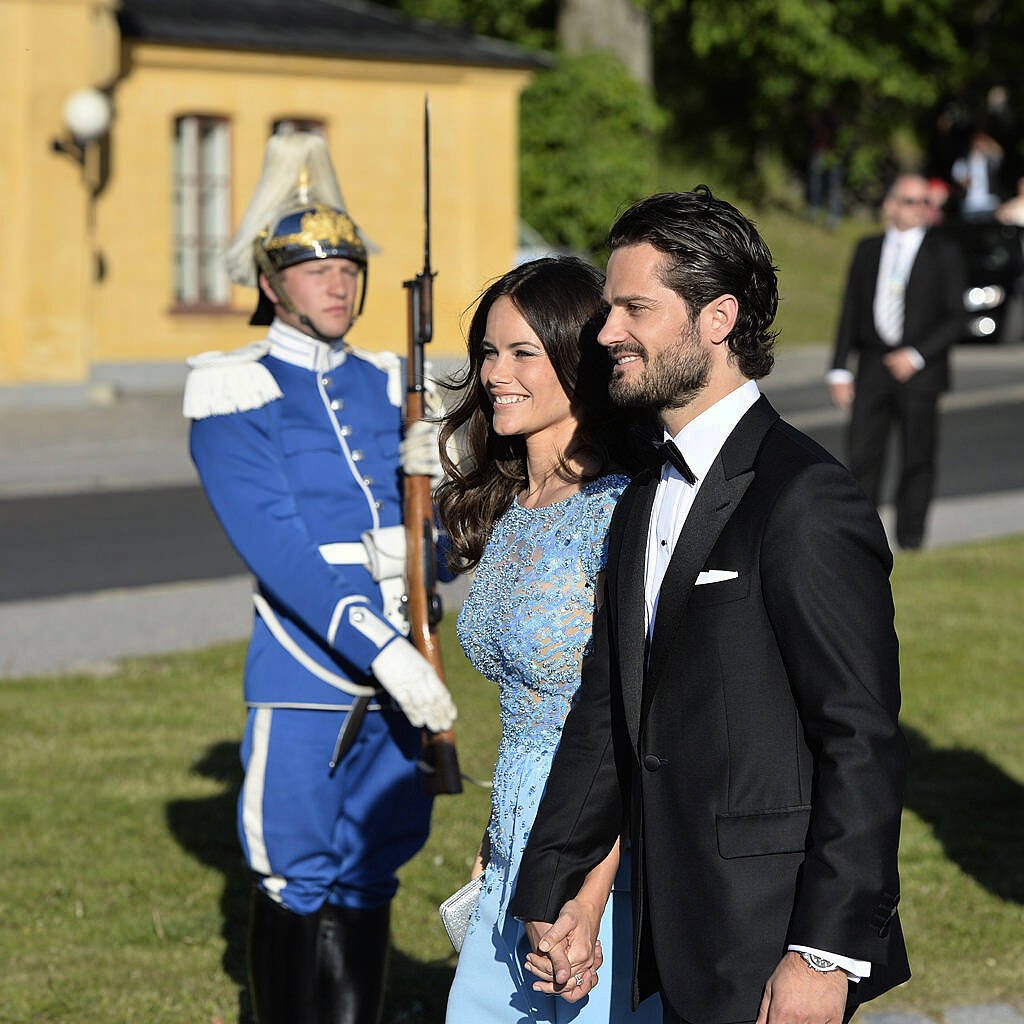 Prince Carl Philip of Sweden (R) and Sofia Hellqvist arrive to Skeppsholmen island after a short boat trip in central Stockholm for the pre-wedding party on the eve of their wedding on June 12, 2015 in Stockholm. AFP PHOTO / TT NEWS AGENCY / ANDERS WIKLUND   SWEDEN OUT        (Photo credit should read ANDERS WIKLUND/AFP/Getty Images)