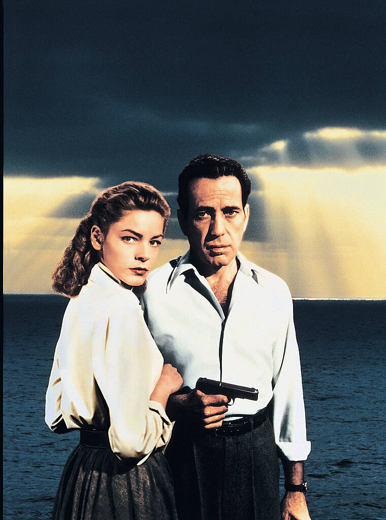 Key Largo (1948)
Directed by John Huston
Shown on ad art, from left: Lauren Bacall, Humphrey Bogart

 WENN.com