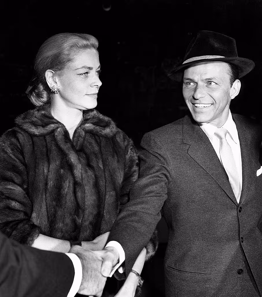 Shown from left: Lauren Bacall, Frank Sinatra arriving at the Egyptian Theater in Hollywood, California for the invitational preview of &quot;Pal Joey.&quot;  (October 15, 1957)

 WENN.com
