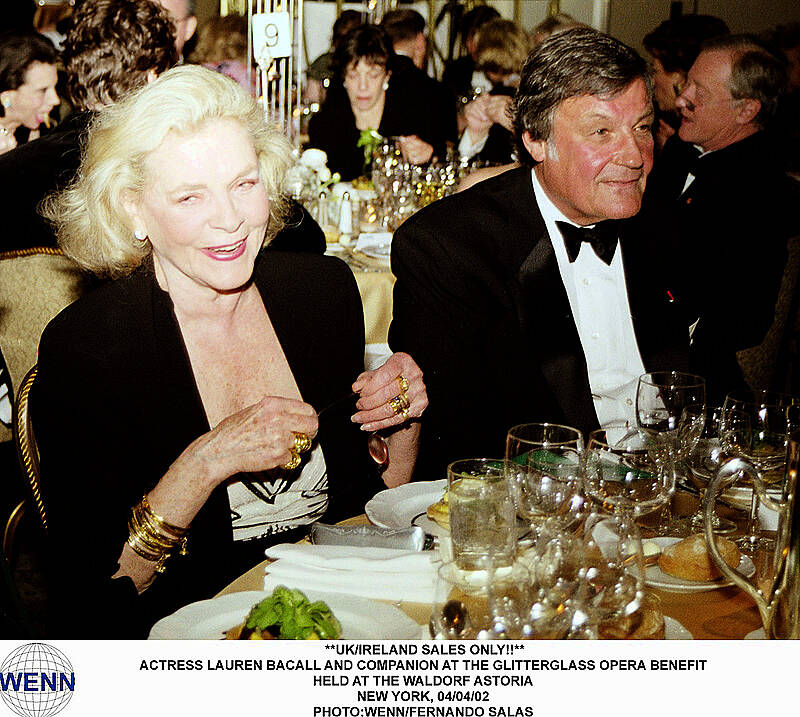 APRIL 4, 2002- ACTRESS LAUREN BACALL AND COMPANION @ THE GLITTERGLASS OPERA BENEFIT HELD @ THE WALDORF ASTORIA-    

Photo by Fernando Salas/WENN


