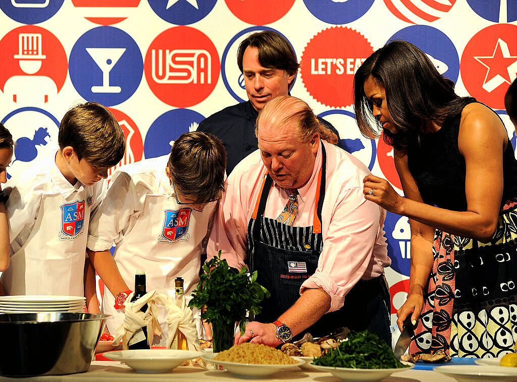 MILAN, ITALY - JUNE 17:  First Lady Michelle Obama hosts a cooking demonstration for local students at the James Beard American Restaurant on June 17, 2015 in Milan, Italy. (Photo by Pier Marco Tacca/Getty Images)