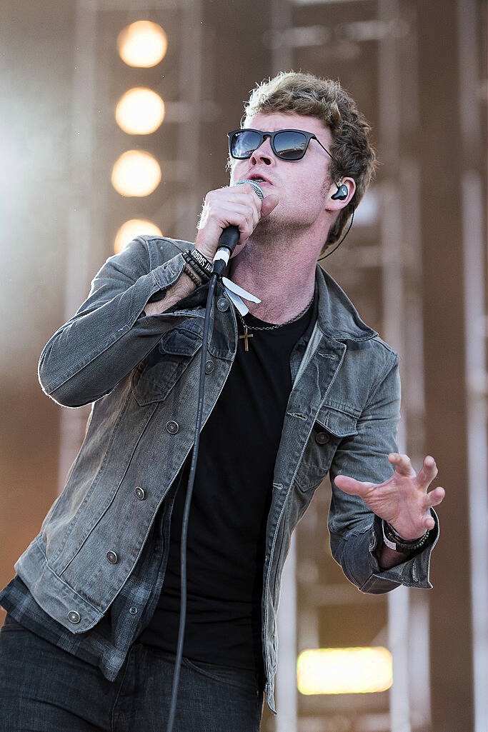 PLYMOUTH, ENGLAND - JULY 22:  Lead singer of Kodaline Steve Garrigan performs on stage during the MTV Crashes Plymouth concert at Plymouth Hoe on July 22, 2014 in Plymouth, England.  (Photo by Matthew Horwood/Getty Images for MTV UK)