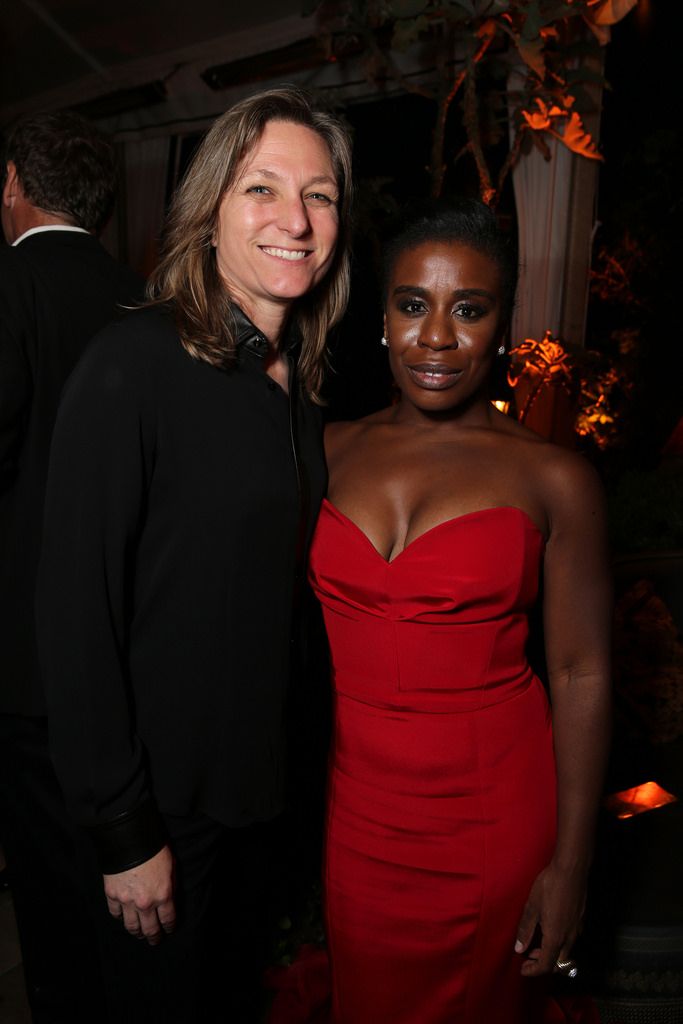 Cinduy Holland, VP of Originals Content and Uzo Aduba seen at the Netflix Celebration of the 66th Primetime Emmy Awards held at the Chateau Marmont on Monday, August 25, 2014, in Los Angeles. (Photo by Eric Charbonneau/Invision for Netflix]/AP Images)