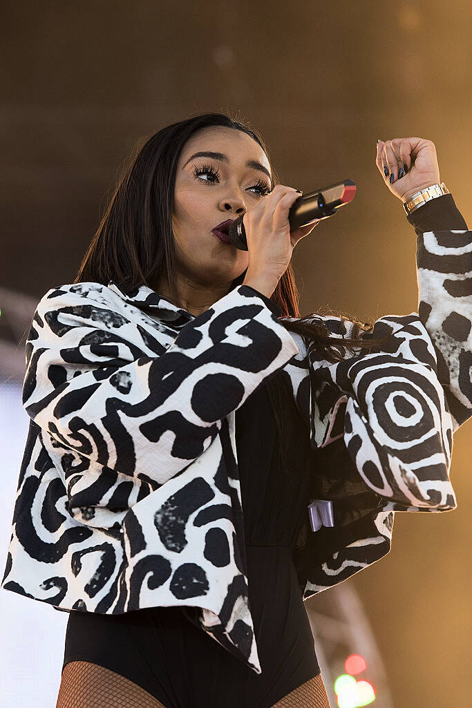 PLYMOUTH, ENGLAND - JULY 22:  Leigh-Anne Pinnock of Little Mix performs on stage during MTV Crashes Plymouth at Plymouth Hoe on July 22, 2014 in Plymouth, England.  (Photo by Matthew Horwood/Getty Images for MTV UK)