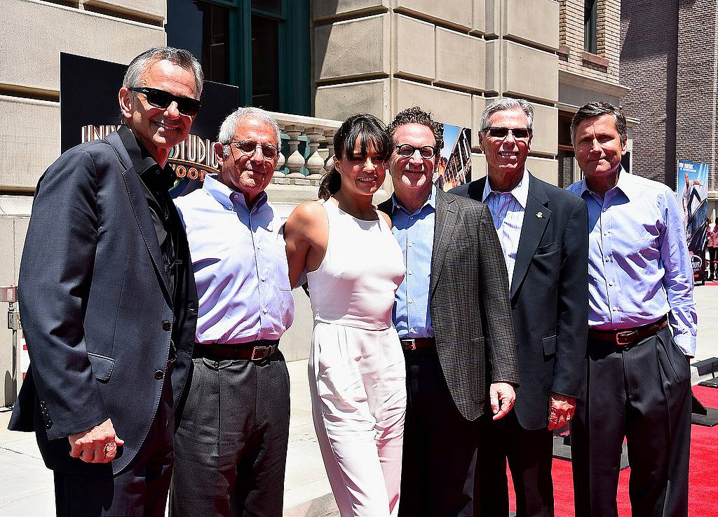 UNIVERSAL CITY, CA - JUNE 23:  Mark Woodbury, President, Universal Creative, Ron Meyer, Vice Chairman, NBCUniversal, actress Michelle Rodriguez, Larry Kurzweil, President & COO Universal Studios Hollywood,  Tom Williams, Chairman, Universal Parks & Resorts and Steve Burke, CEO NBCUniversal attend the premiere press event for the new Universal Studios Hollywood Ride "Fast & Furious-Supercharged" at Universal Studios Hollywood on June 23, 2015 in Universal City, California.  (Photo by Alberto E. Rodriguez/Getty Images)